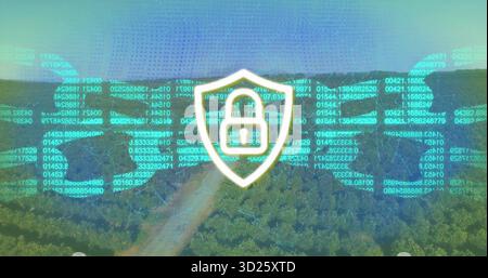 Hovering shield-shaped badge projecting digital code overlay above dense forest canopy, security Stock Photo