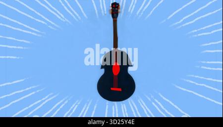 Featuring acoustic guitar silhouette with red details on blue backdrop, emitting white radial burst Stock Photo
