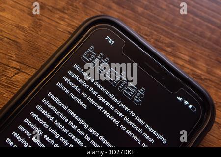 Website of Bitchat is seen in on an iPhone screen. Bitchat is a peer-to-peer messaging app using Bluetooth mesh, without internet or central servers. Stock Photo