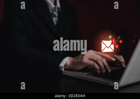 Businesswoman check computer inbox, receives warning notification about potential cybersecurity breach, concept of spam email detection, error checkin Stock Photo