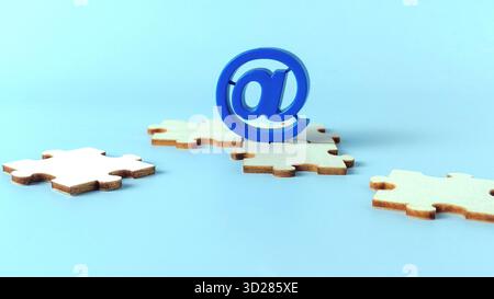 Blue At Symbol on Wooden Jigsaw Puzzle Pieces Representing Email Integration, Communication Solutions, and Connecting Online Stock Photo
