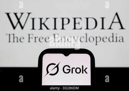 Indonesia. 31st Oct, 2025. In this photo illustration, a Grokipedia logo is displayed on a smartphone and a Wikipedia logo in the background. (Photo by Algi Febri Sugita/SOPA Images/Sipa USA) *** Strictly for editorial news purposes only *** Credit: Sipa USA/Ģ����ý Live News Stock Photo