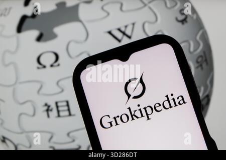 Indonesia. 31st Oct, 2025. In this photo illustration, a Grokipedia logo is displayed on a smartphone and a Wikipedia logo in the background. (Photo by Algi Febri Sugita/SOPA Images/Sipa USA) *** Strictly for editorial news purposes only *** Credit: Sipa USA/Ģ����ý Live News Stock Photo