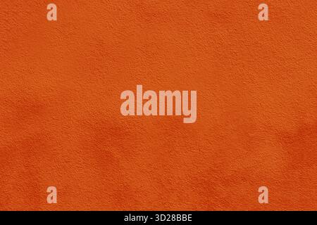 Orange concrete wall. Orange concrete wall texture background. Stock Photo