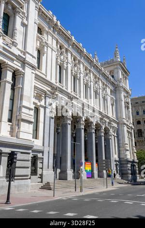 Madrid, Spain - July 9, 2022: A western facade of Cibeles Palace (Spanish: Palacio de Cibeles), the Madrid City Hall, with the Madrid Pride Parade ban Stock Photo
