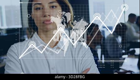 Standing woman wearing white shirt crossing arms in office, with monitors displaying data overlay Stock Photo
