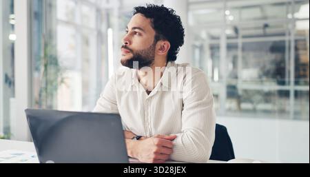 Businessman, laptop and thinking with decision in office for business vision, idea or ambition. Thoughtful, man or employee contemplating with Stock Photo