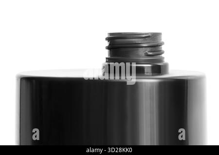 Cosmetic product black plastic opened jar closeup isolated over white Stock Photo