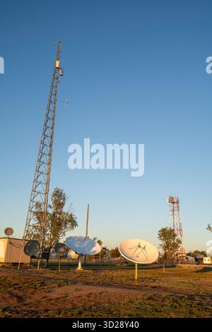Telcommunication tower and satellite dishes, Muttaburra, Queensland, Australia Stock Photo