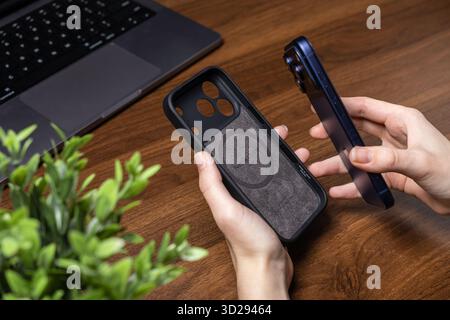 Poznan, Poland - October 16, 2025: Native Union case for iPhone 17 Pro presented alongside the blue smartphone, highlighting essential device protecti Stock Photo