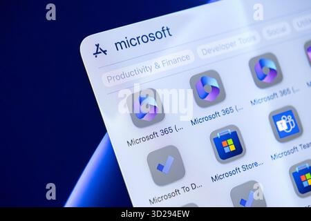 Poznan, Poland - October 16, 2025: Close-up of the Apple App Store interface presenting Microsoft applications, emphasizing Productivity & Finance for Stock Photo