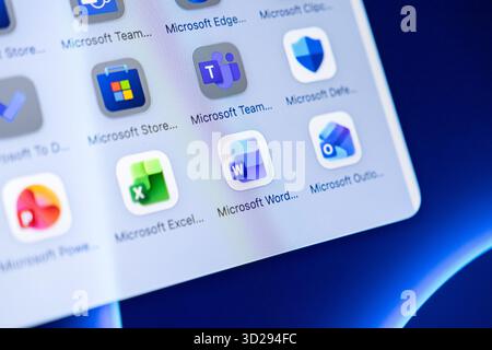 Poznan, Poland - October 16, 2025: Microsoft Word app central on screen, with Excel, Teams, Store, Outlook, essential for modern office operations Stock Photo