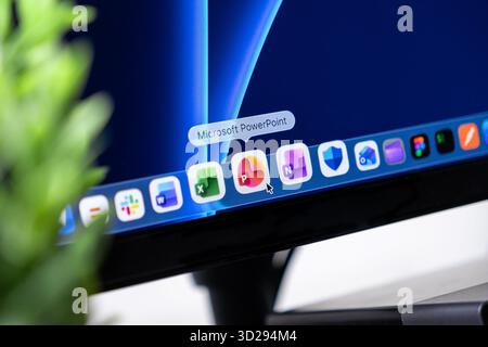 Poznan, Poland - October 16, 2025: Microsoft PowerPoint, app icon on display, cursor hovering, reflecting essential role for professional presentation Stock Photo