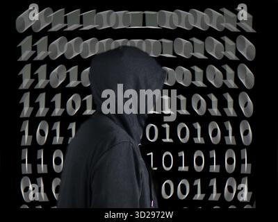 The image depicts cybercrime against a monitor displaying moving white binary code. Stock Photo