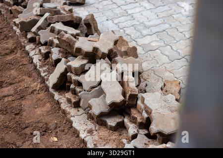 selective focus brick block worm piled on the ground The area is being adjusted to be even. Stock Photo