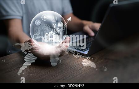 A businessman with laptop and glowing bubble filled with global banking, cryptocurrency, and finance icons, representing asset inflation, digital econ Stock Photo