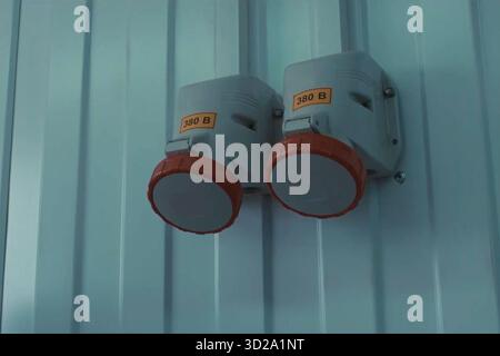 Sockets at 380 volts. Closed Industrial Outlets Stock Photo