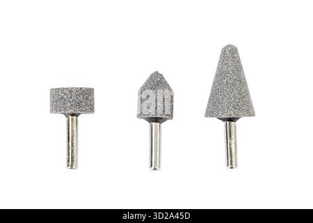Three mounted grinding stones with different shapes on white background, used for grinding, sharpening, and polishing metal or hard materials Stock Photo