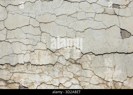 Cracked weathered wall texture in outdoor daylight Stock Photo