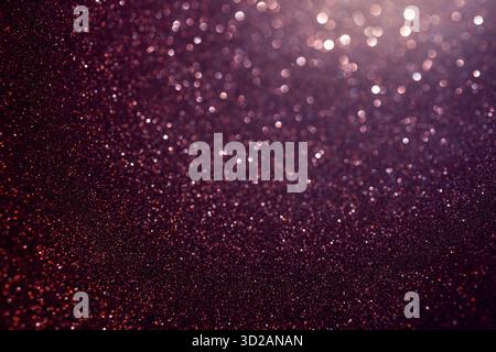 Curved copper glitter surface with focus following arc, detailed sparkling texture below transitions inward into blurred bokeh glow across abstract fr Stock Photo