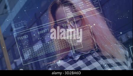 Data analyst analyzing holographic data panels in office space, with checkered shirt and eyeglasses Stock Photo
