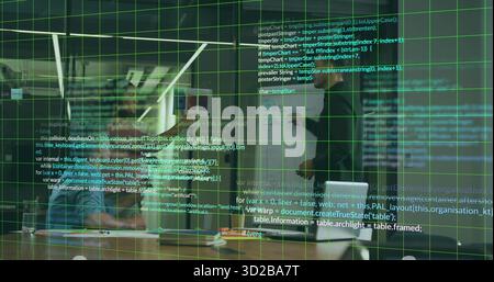 Collaborating two developers discussing design in open office, with laptop whiteboard digital grid Stock Photo