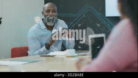 IT consultant in shirt discussing biometric security in office, with fingerprint overlay graphics Stock Photo