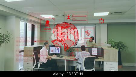 Collaborating three office workers viewing bar chart and security overlay in office, with monitors Stock Photo
