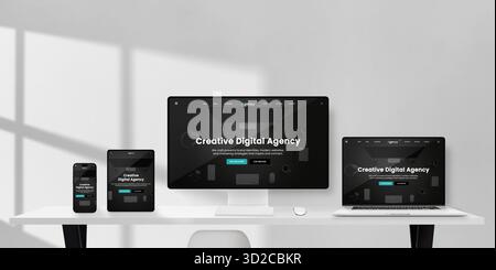 Modern workspace with smartphone, tablet, and desktop computer displaying creative digital agency website responsive layout in dark mode on minimalist Stock Photo