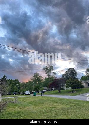 A dramatic sunset sky over a residential area in Knoxville, Tennessee. Stock Photo