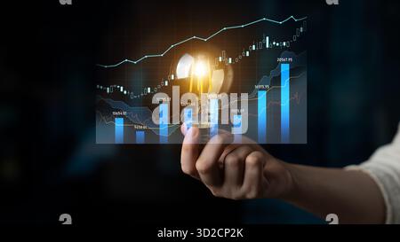 Conceptual image showcasing a glowing light bulb representing innovative ideas alongside finance charts, depicting growth and analysis for business de Stock Photo