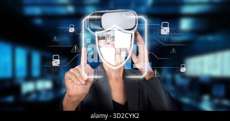 A professional using virtual reality technology to emphasize cybersecurity solutions in protecting data and online privacy in a modern digital workspa Stock Photo