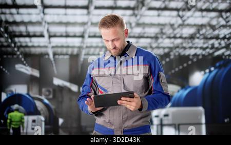 Industrial Engineer Conducting OSHA Pipe Inspection At Energy Facility Plant. Stock Photo