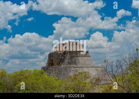 A beautiful landscape of the Pyramid of the Magician in the Mayan archeological site of Uxmal in southern Mexico Stock Photo