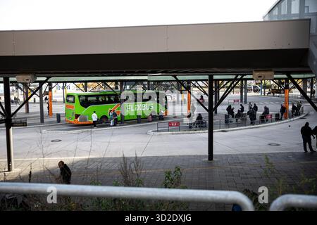 Berlin, Germany. 01st Nov, 2025. Travelers board a FlixBus at Berlin's Central Bus Station (ZOB) on Saturday, November 1, 2025. The busy hub on Masurenallee connects Germany's capital with destinations across Europe, reflecting the growing popularity of low-cost intercity bus travel. (Photo by Michael Kuenne/PRESSCOV/Sipa USA) Credit: Sipa USA/Ģ����ý Live News Stock Photo