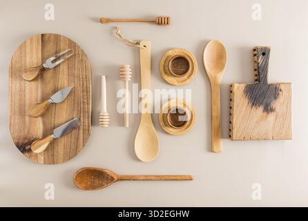 Various kitchen utensils made of wood on a pastel background. top view. flat lay Stock Photo