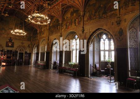 Gothic style windows and vaulted ceilings define the Banqueting Hall of Cardiff Castle in Wales, UK. Stock Photo