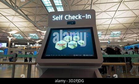 SEOUL, SOUTH KOREA - OCTOBER 11, 2025 - Airport self check in kiosk screen displaying airline options for passengers arriving at Incheon Stock Photo