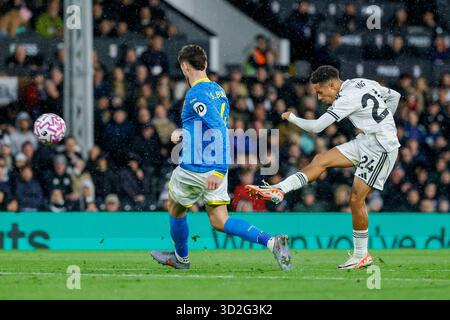 Josh King of Fulham FC shoots during the Premier League match between ...