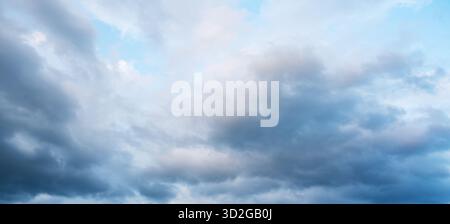 Clouds in the background, photographed during the day. Stock Photo