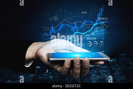 A realistic depiction of a hand holding a smartphone, displaying vibrant financial graphs and data analytics, symbolizing modern technology in busines Stock Photo