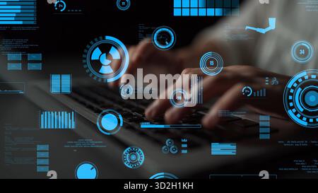 Close-up of hands typing on a laptop with blue data visualizations surrounding the screen, symbolizing technology, analytics, and modern digital envir Stock Photo