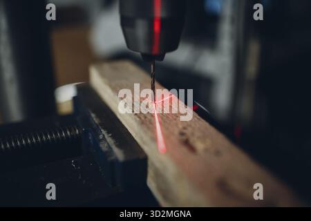Drilling machine with laser sight in the workshop Stock Photo