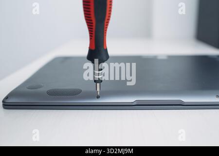 Disassembly and repair laptop. Service, replacement cooling system, fan cooler and thermal paste Stock Photo