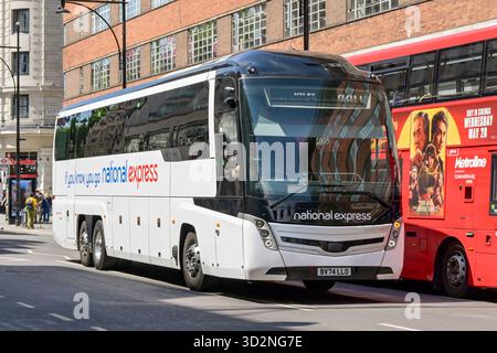 London, England, Uk - 4 July 2025: Express coach operated by National Express driving on Oxford Street in central London Stock Photo