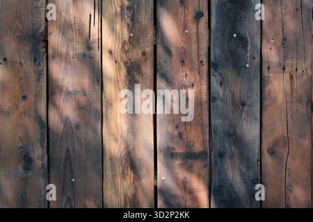 Weathered Wooden Planks with Natural Light and Texture Stock Photo