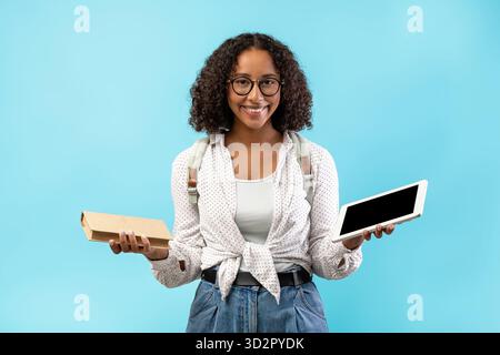 Exploring Online Education and Offline Studies With a Smiling Female Student Stock Photo