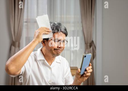 Older adults are targeted by phone scams and fraud. Stock Photo