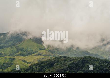 Low Clouds Rolling Over Green Mountains in Monteverde, Costa Rica Stock Photo