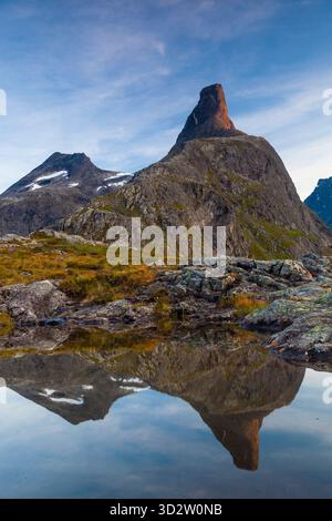 The Mountain Romsdalshorn 1550 M Reflected In A Small Lake In The The Mountain Romsdalshorn 1550 M Reflected In A Small Lake In The